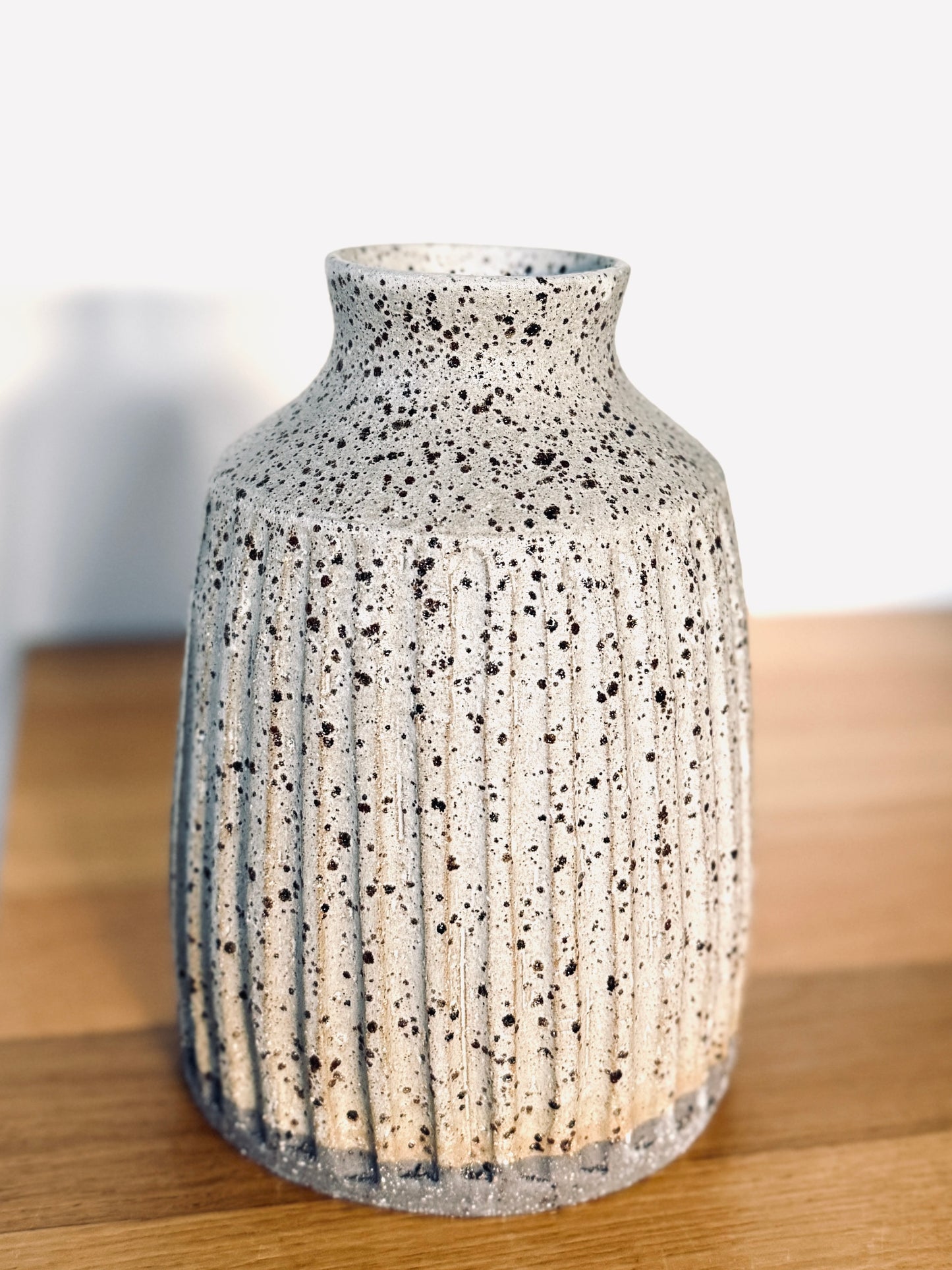 Speckled vase- carved