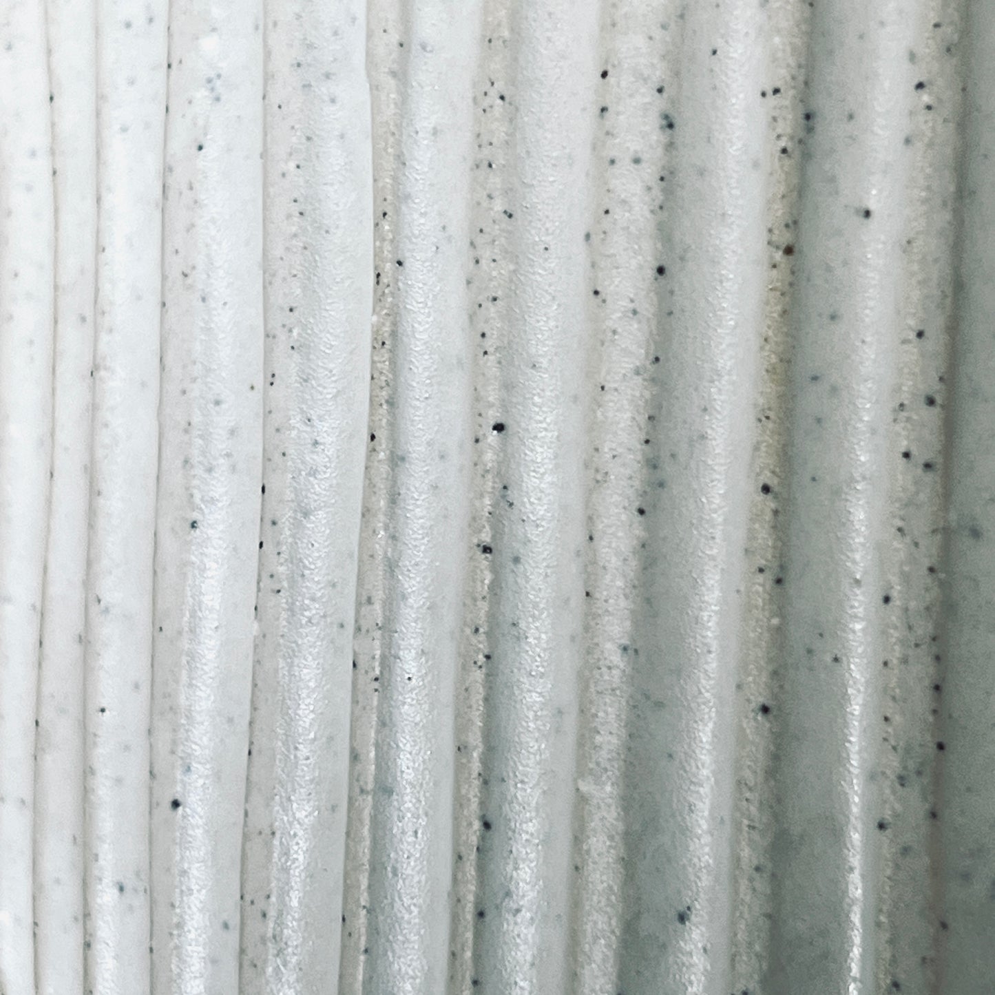 Carved wall sconce- speckled white