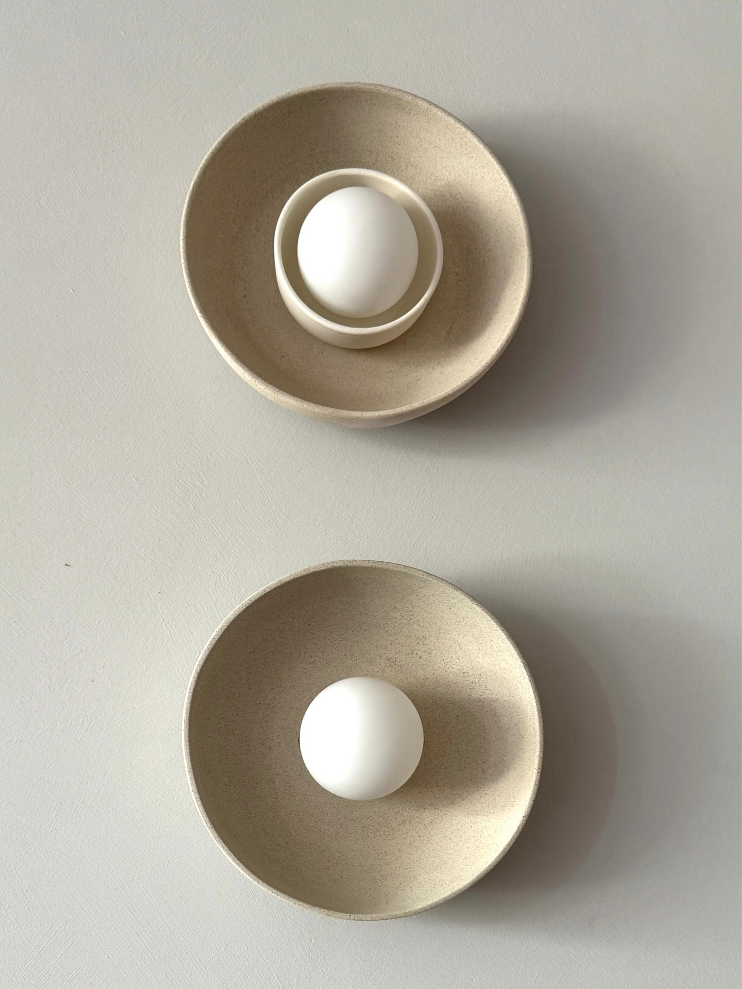 Natural clay wall sconce