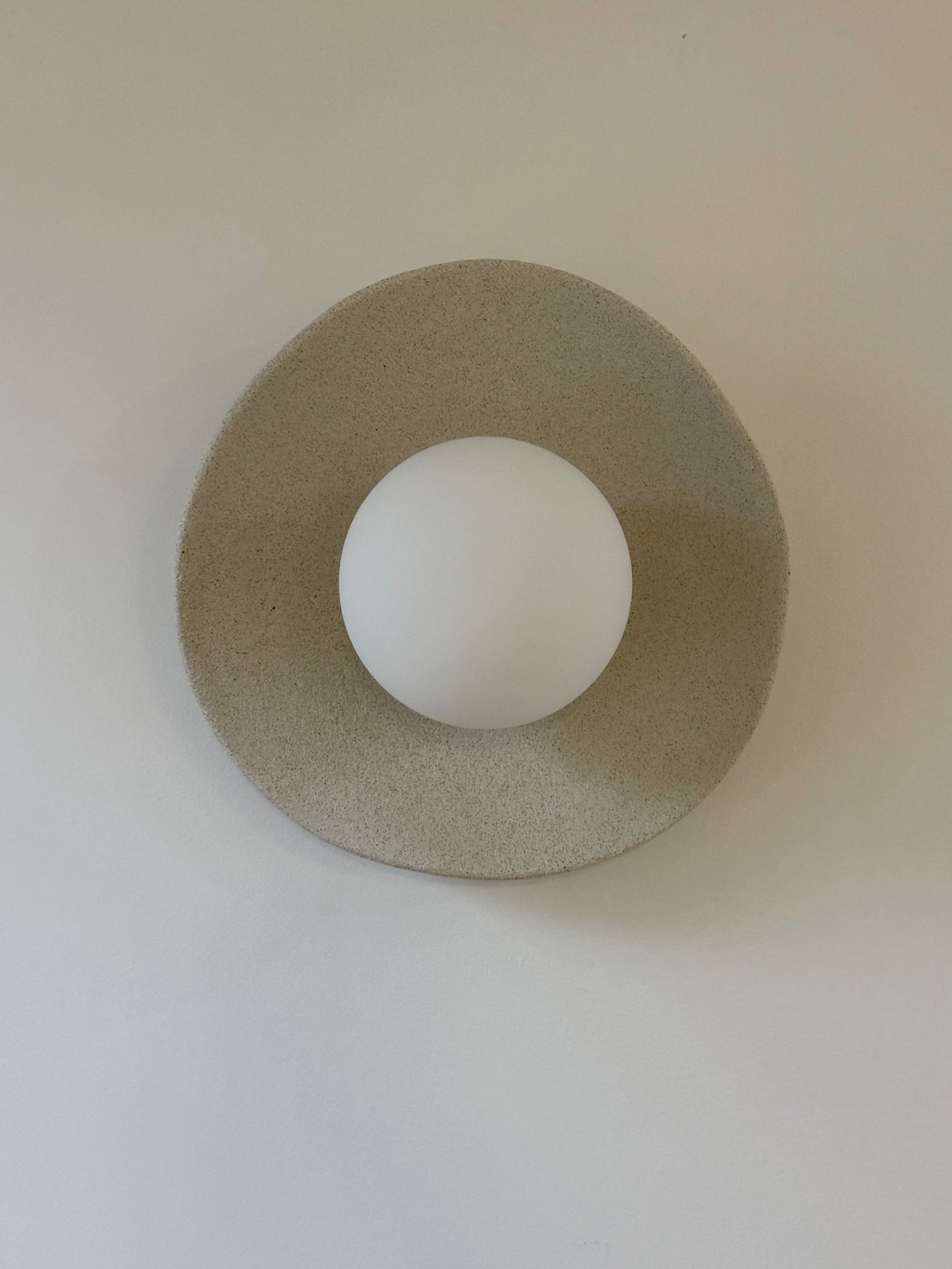 Natural clay wall sconce- dimpled