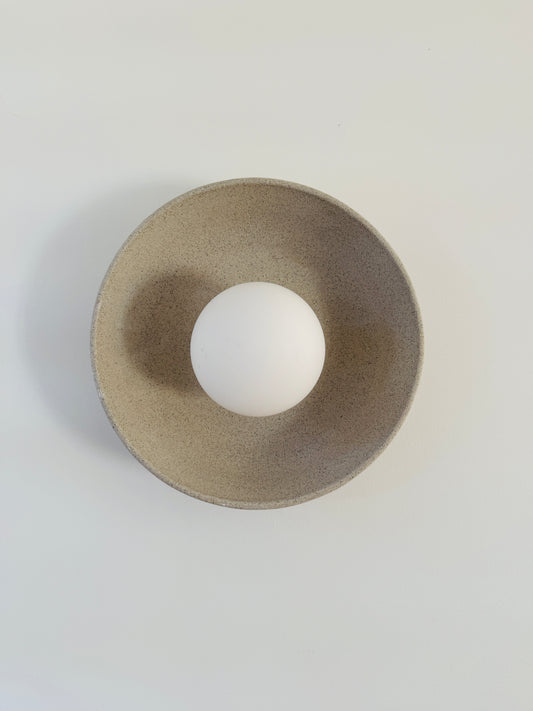 Natural clay wall sconce