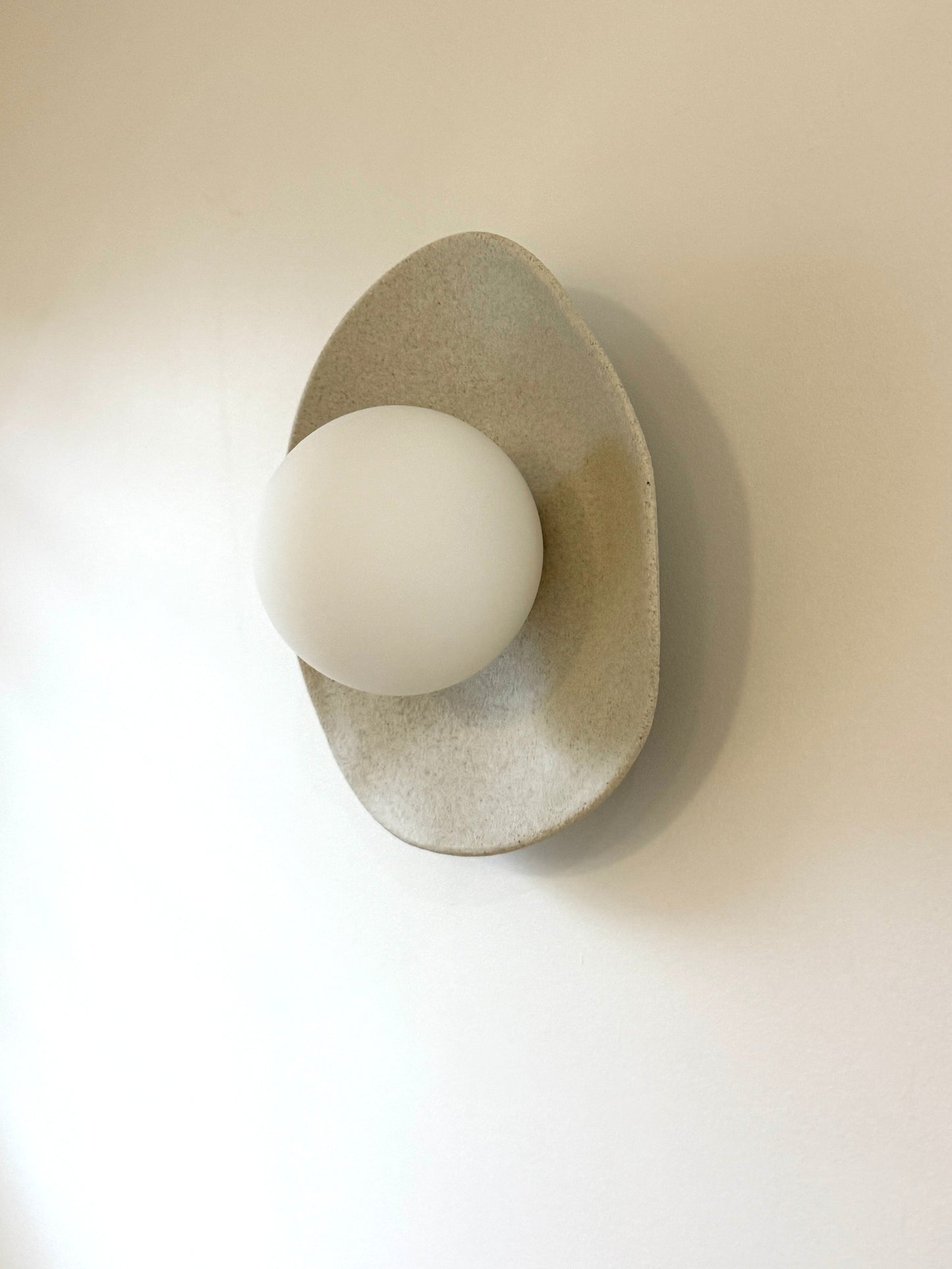 Natural clay wall sconce- dimpled