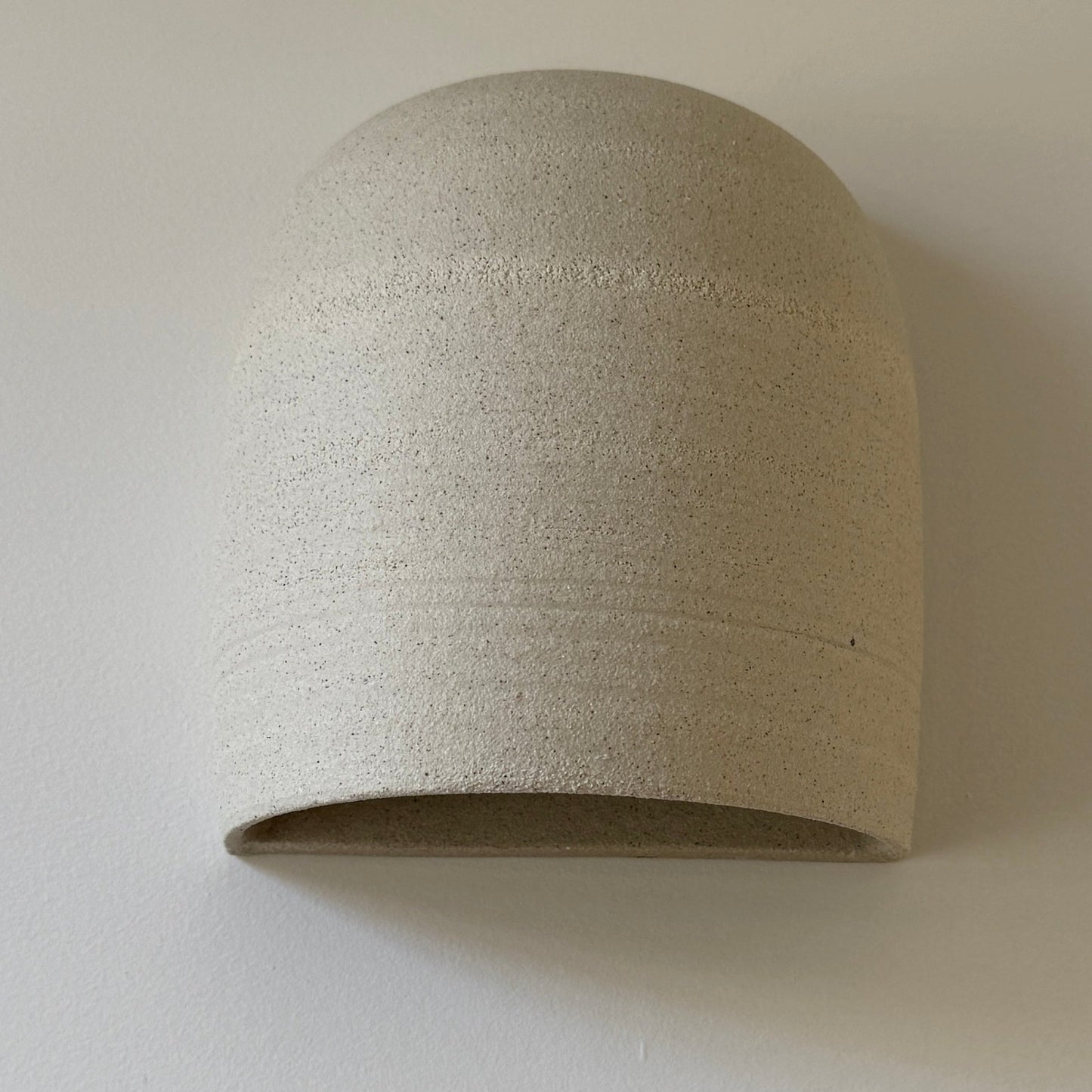 Arched Raw clay wall sconce