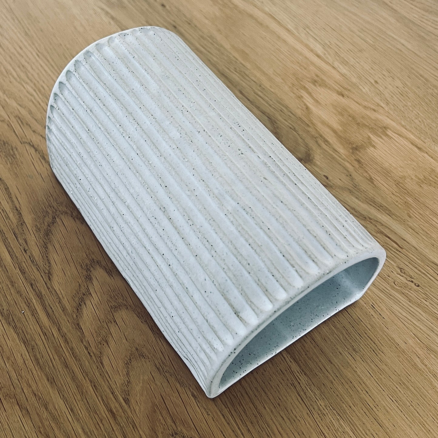 Carved wall sconce- speckled white